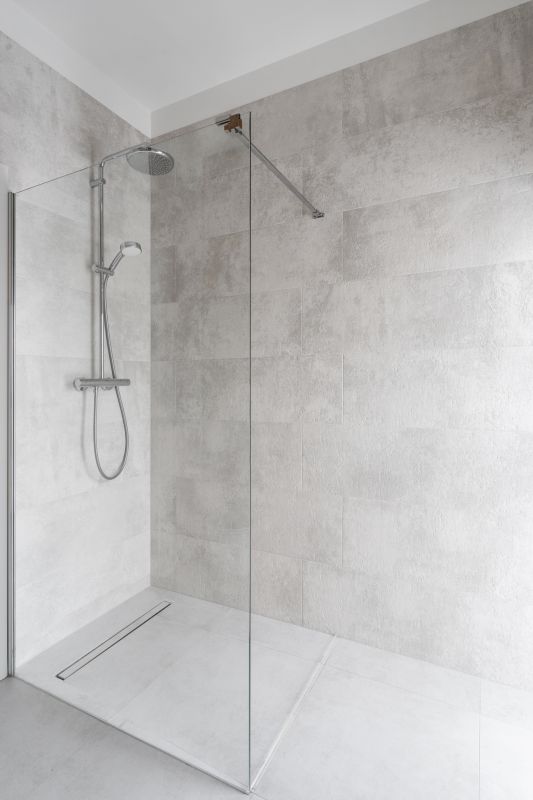 Frameless Glass Shower with Chrome Accents
